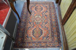A small Persian rug.