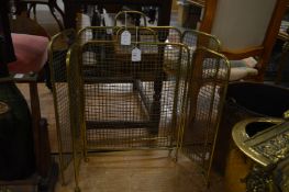 Two brass folding spark guards.