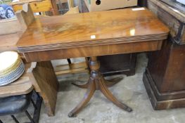 A modern card table.