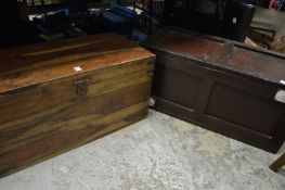 Two wooden trunks.
