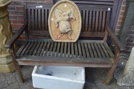 A wooden garden bench.