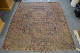An old Persian rug (worn).