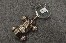 A decorative magnifying glass.