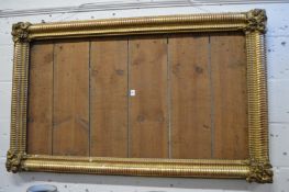A 19th century decorative gilt mirror frame.
