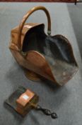 A good copper coal scuttle with shovel.