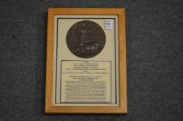 A framed and glazed WW1 bronze memorial death plaque or 