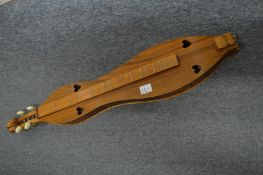 A Dulcimer stringed musical instrument.