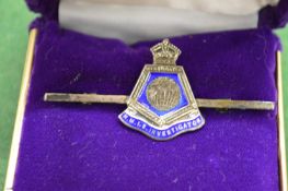 A silver and enamel bar brooch HMIS Investigator.