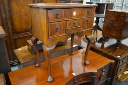 A miniature walnut low boy.