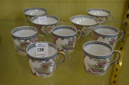 Nine Japanese eggshell teacups.
