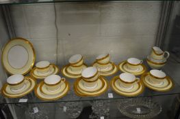 A Royal Worcester gilt and cream decorated part service comprising numerous cups, saucers, side