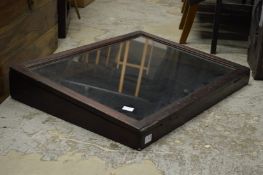 A table-top display cabinet.