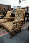 A good Victorian walnut library open armchair.