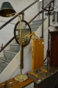 A floor standing lamp, mirror, clothes valet and bentwood coat stand.