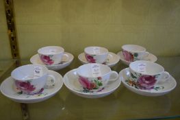 Six small Dresden cups and saucers.