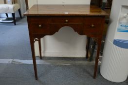 A Georgian mahogany low boy.