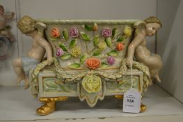 Decorative continental porcelain centrepiece.