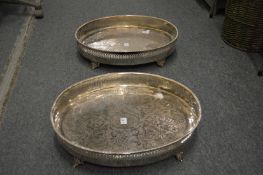 A pair of large silver plated and engraved galleried trays.