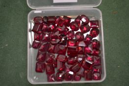 Ruby coloured stones.
