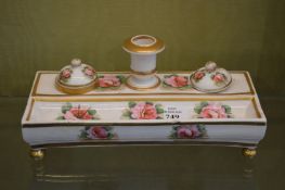 A Spode porcelain inkstand decorated with roses.