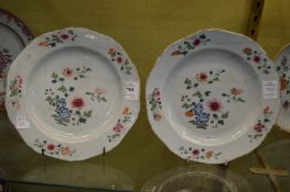 A pair of Chinese Famille Rose plates.