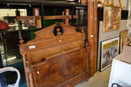 A French walnut bedframe and base.