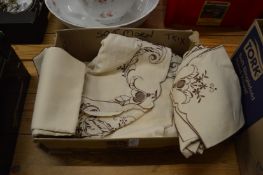 Embroidered tablecloth and napkins.