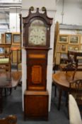 A 19th century oak and mahogany eight day long case clock with painted arched dial.