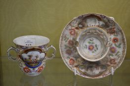 A Dresden porcelain cup and saucer.