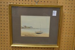 A coastal landscape with a moored dinghy watercolour.