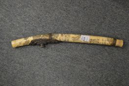 A Japanese bone pipe.