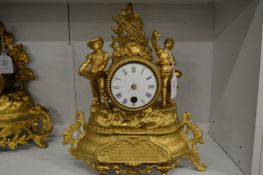 A gilt metal clock case (replacement movement).