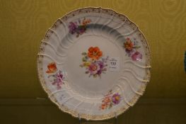 A Berlin floral decorated plate.