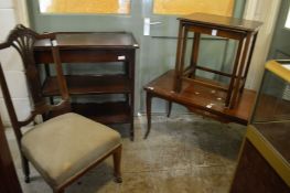 A chair, tea trolley, a nest of tables and a coffee table.