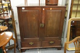 A George III mahogany two door press cupboard.