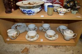 An oriental part tea service.