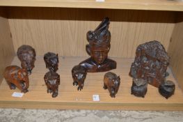 Carved wood elephants and other items.