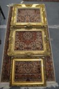 Three gilt picture frames.