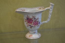 A small floral decorated jug.