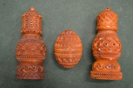 Three coquilla nut pounce pots.