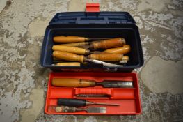 A tool box containing chisels.