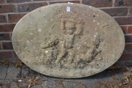 An oval composite garden wall plaque of classical form.