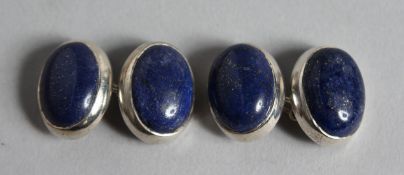 A PAIR OF SILVER AND LAPIS CUFF LINKS