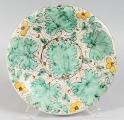 A RARE 18TH CENTURY OAK LEAF DESIGN TIN GLAZE CHARGER. 13ins diameter.