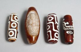 FOUR INLAID AGATE BEADS
