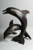 A GOOD DOLPHIN GROUP, two leaping dolphins. 18ins high.