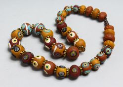 A COLOURFUL BEAD NECKLACE.