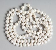 A LONG ROW OF PEARLS 48ins long.
