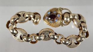 A VICTORIAN HEART SHAPED LOCK AND CHAIN.