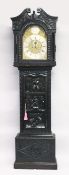 A 19TH CENTURY CARVED OAK LONG CASE CLOCK with eight day movement, arch brass dial with subsidiary